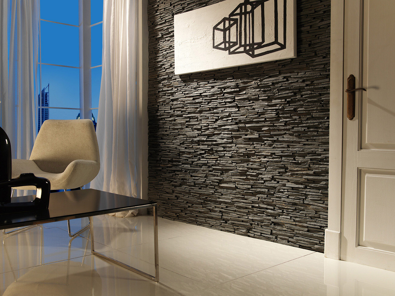 hotel room with dark grey stone wall next to door
