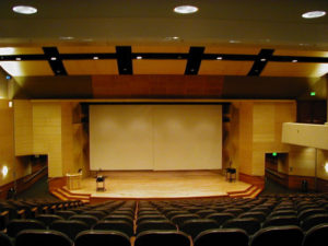 wooden stage with wooden walls and ceiling